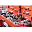 A photo of a bottle of GorillaPro AT160 red large thread threadlocker in a tool chest next to hand tools. (Product image)